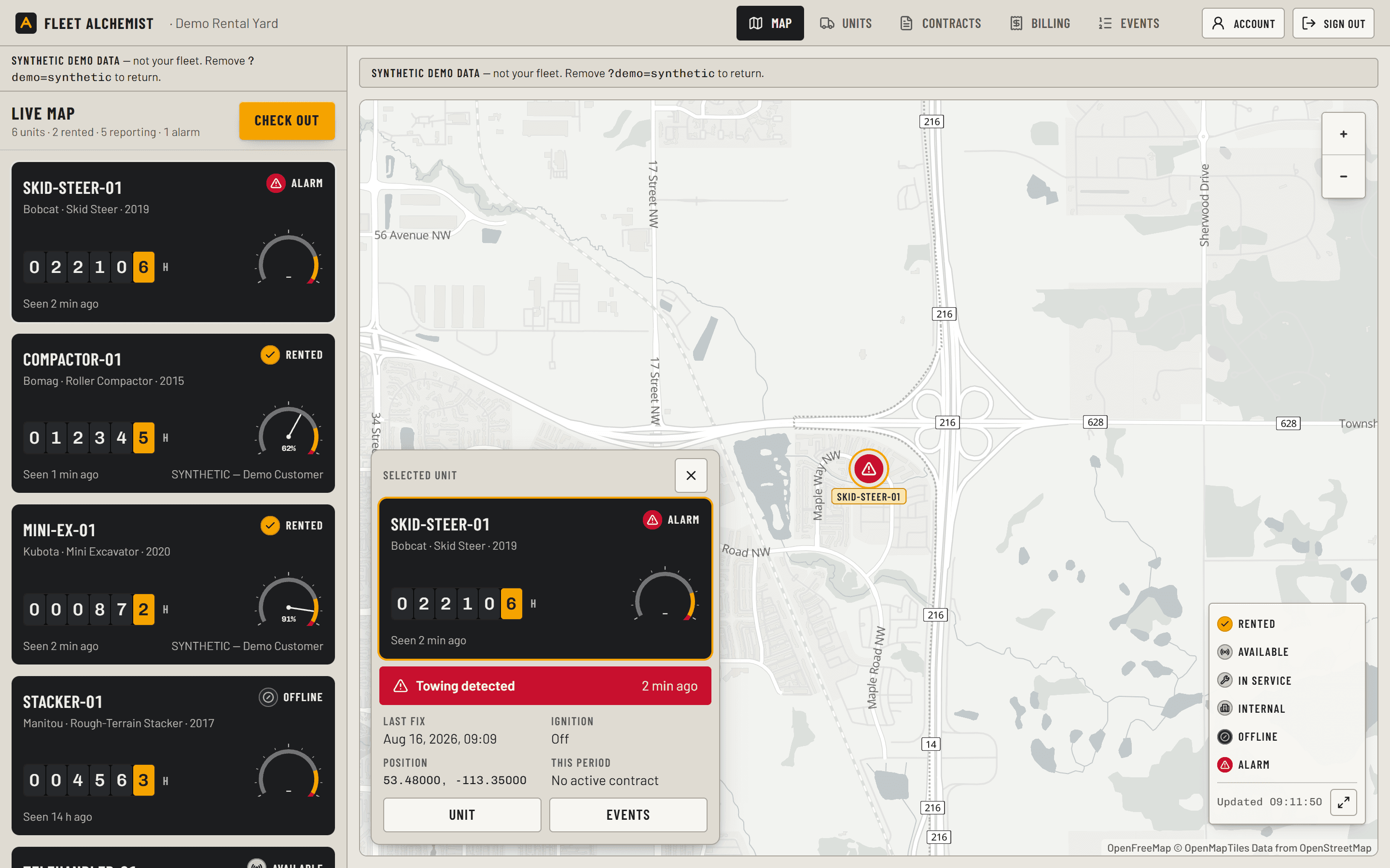 The live map in demo mode: a rail of six unit gauge cards on the left, a street map of northeast Edmonton on the right, and the selected unit — a telehandler — docked over the map with a red Alarm lamp, a red bar reading Towing detected 2 min ago, its last fix, ignition state Off and coordinates 53.48000, -113.35000.
